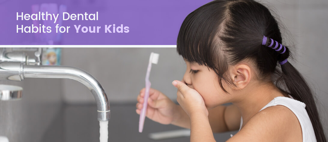Young girl brushing her teeth for a good dental health