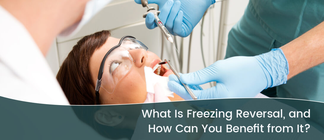 A dentist giving a freezing reversal to a patient