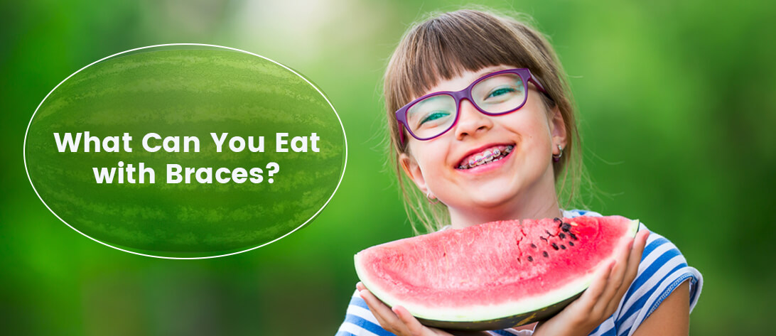 Child eating watermelon with braces